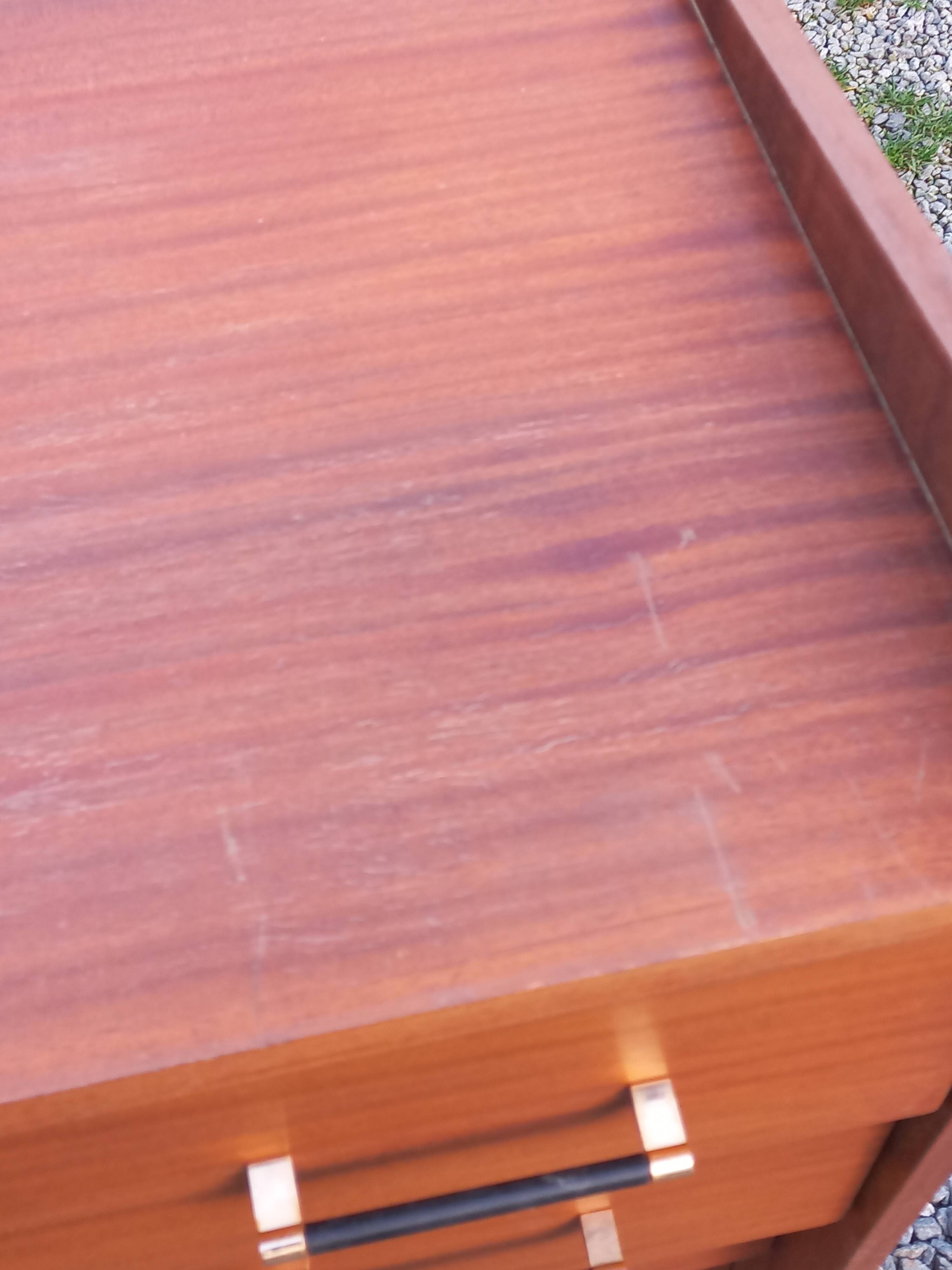 Vintage mahogany commode with metal tapered legs, 4 drawers, 1950s.