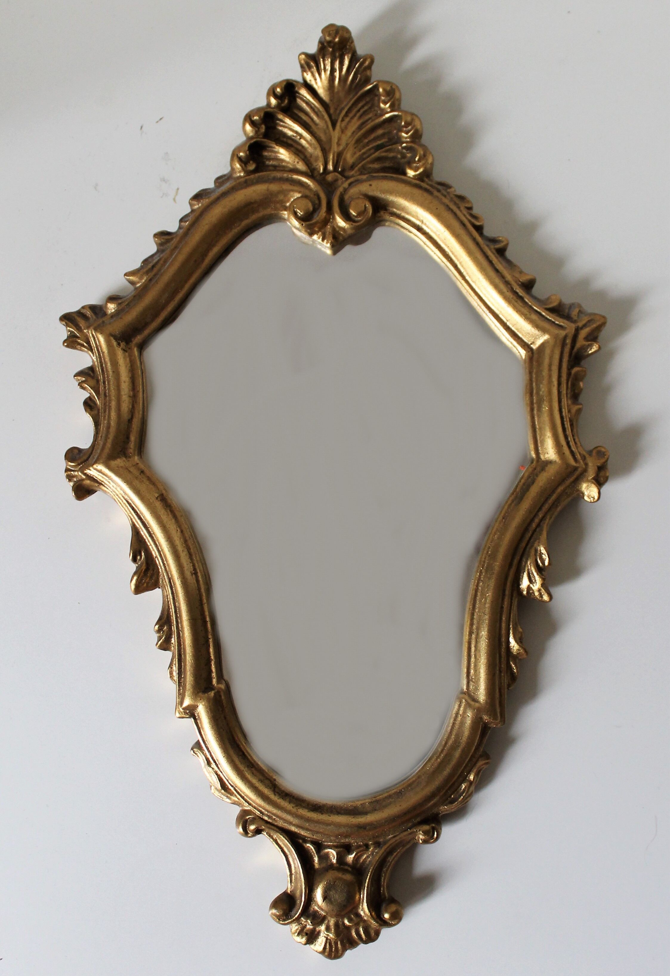 Miroir et sa console dorés style rocaille