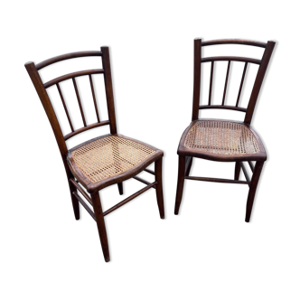 Pair of canned bistro chairs