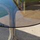 Oval glass and stainless steel table 70s