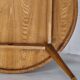 Italian round table with tapered brass leg ends, 1950s