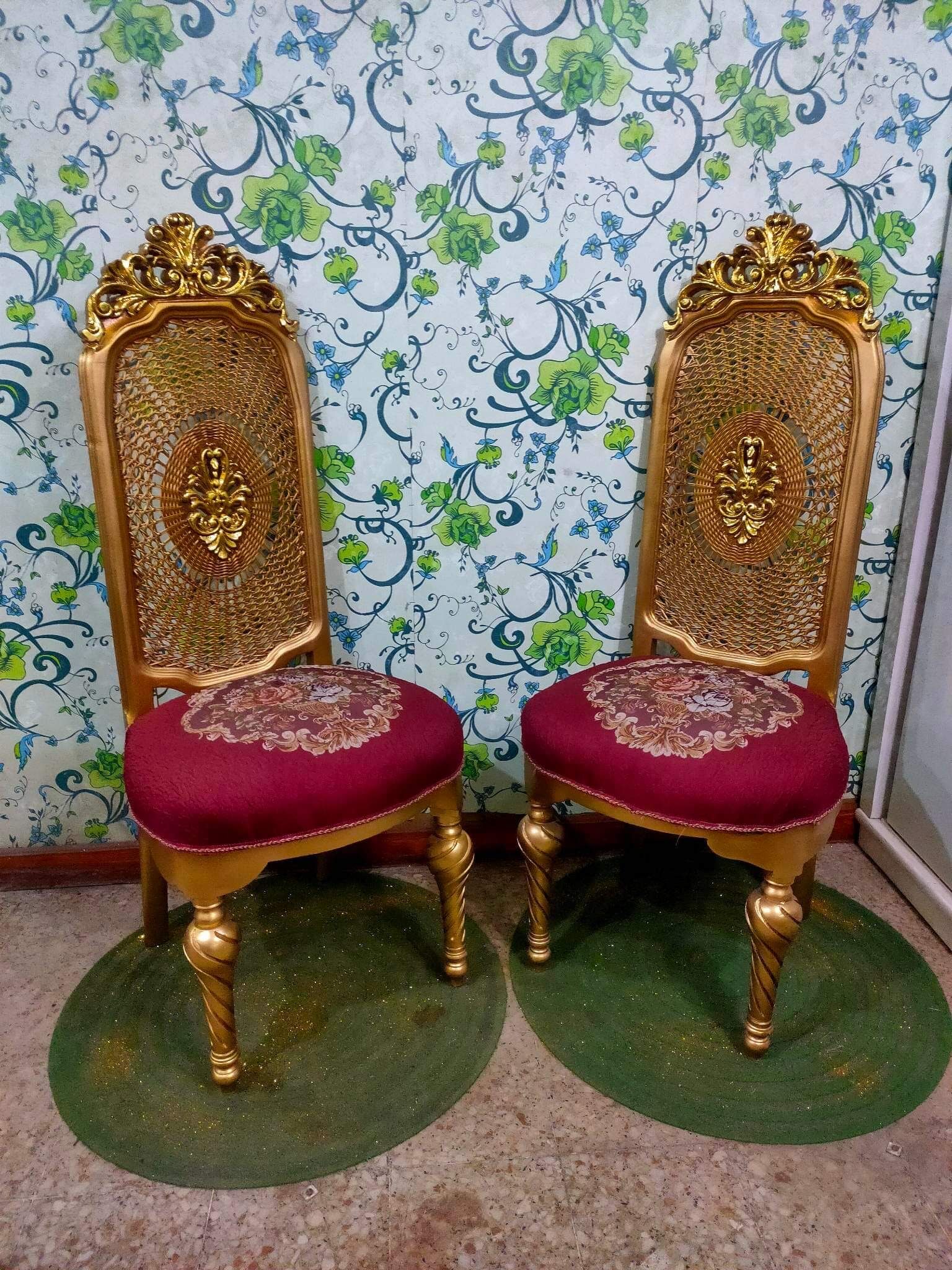 Pair of gilded chairs with Louis XV style floral pattern