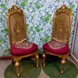 Pair of gilded chairs with Louis XV style floral pattern