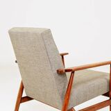 Beige mixed vintage armchair from the 1970s.