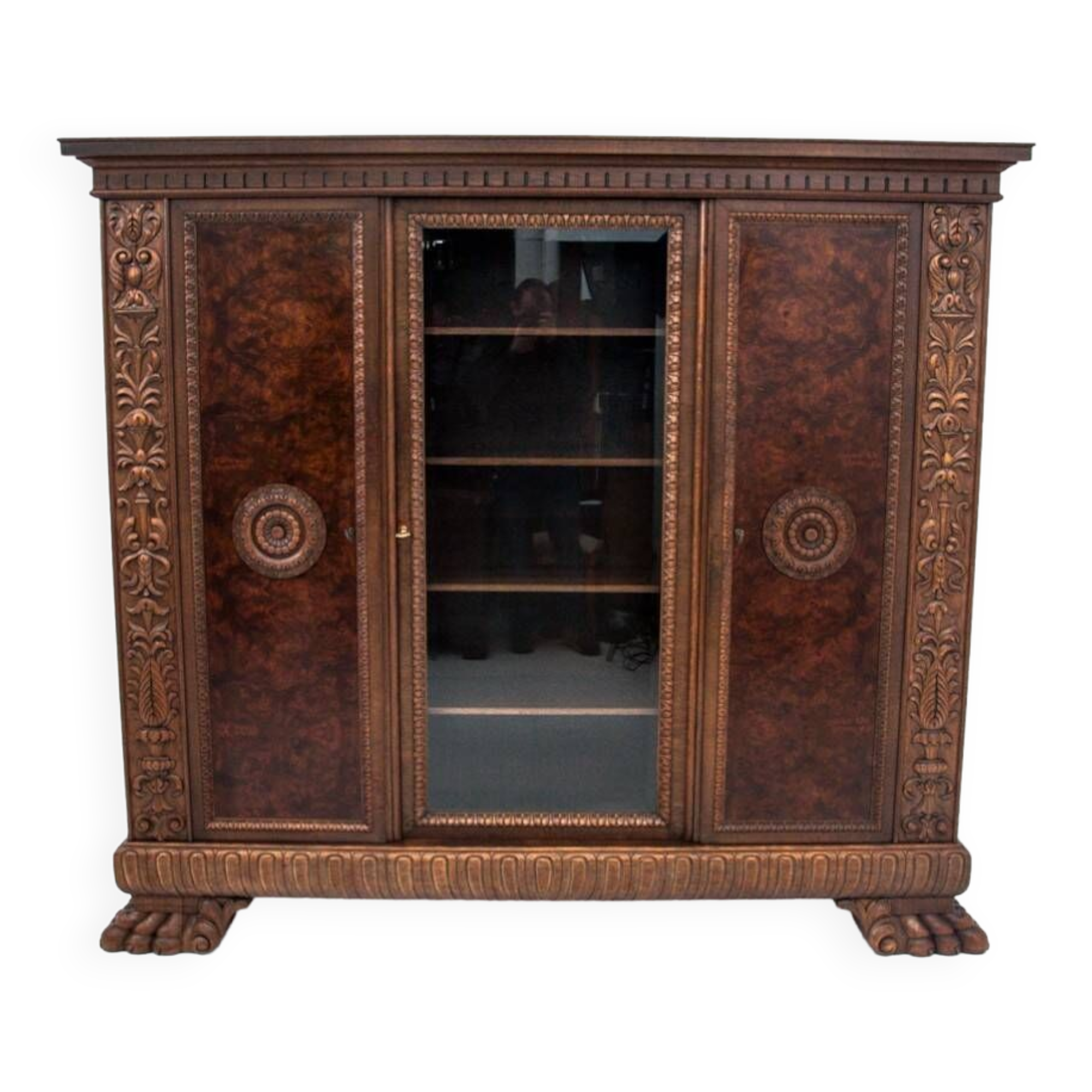 Cabinet set on lion's paws, Germany, early 20th century.