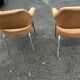 Paire de fauteuils vintage à piètement métal et tissu orange 60 70
