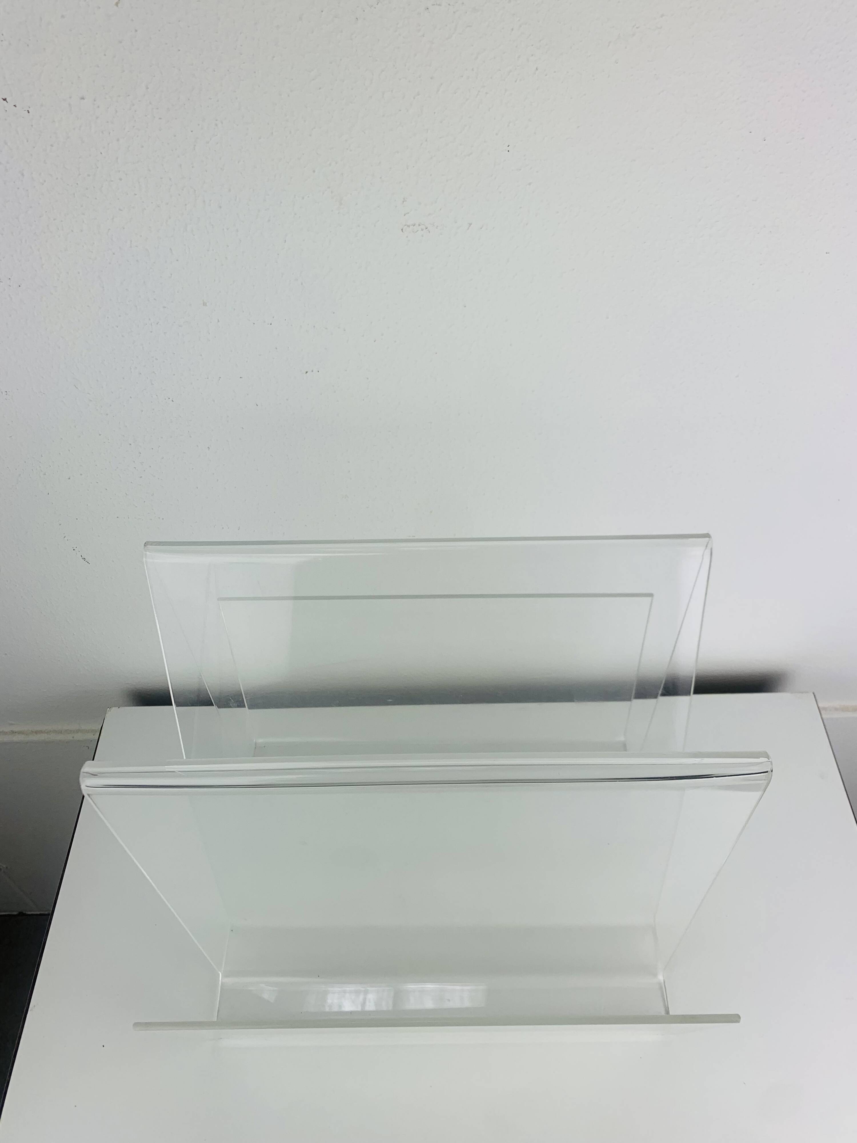Acrylic magazine rack from the 70s.