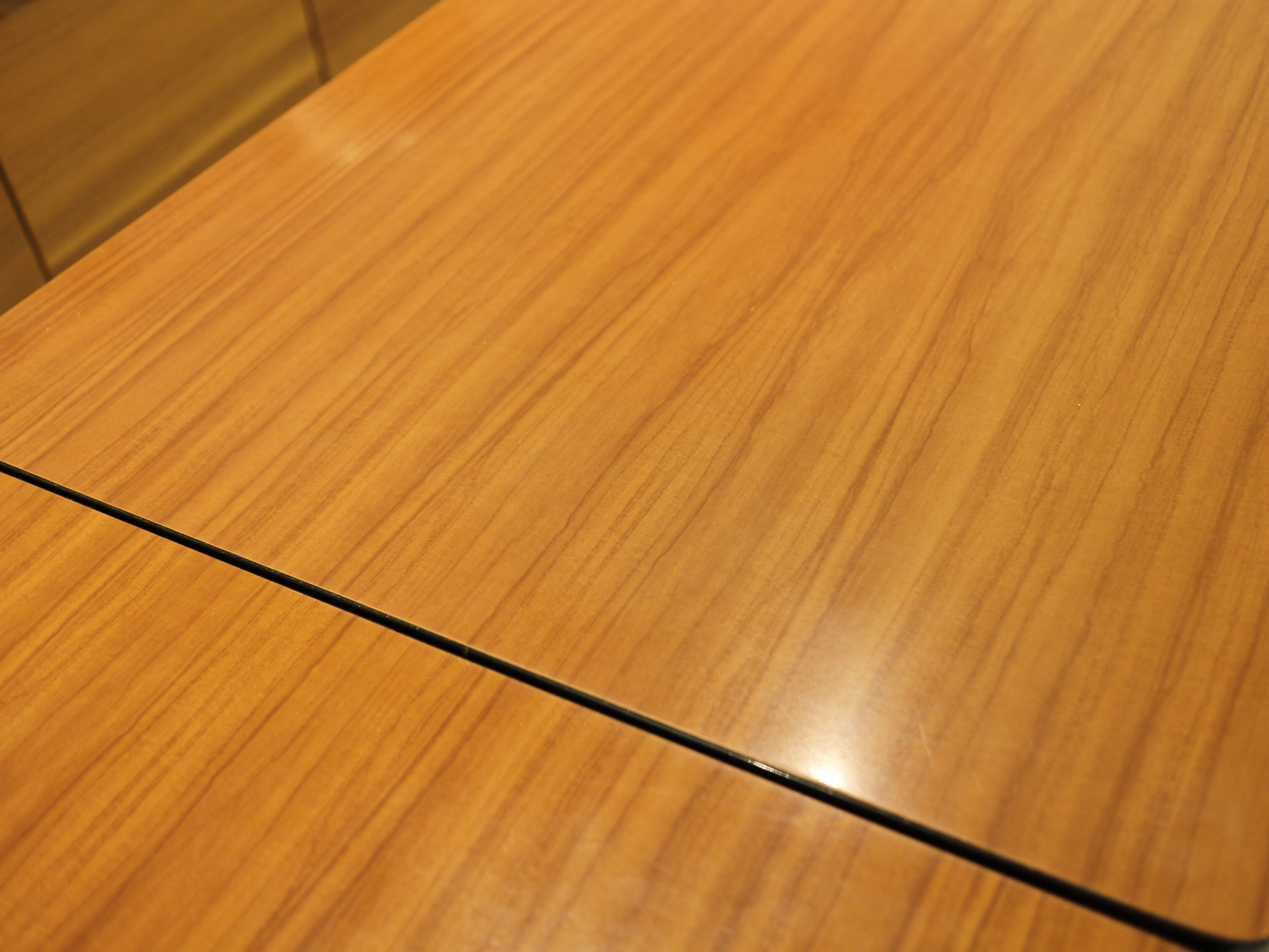 Briwn Formica table with extension cords and drawer