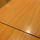 Briwn Formica table with extension cords and drawer