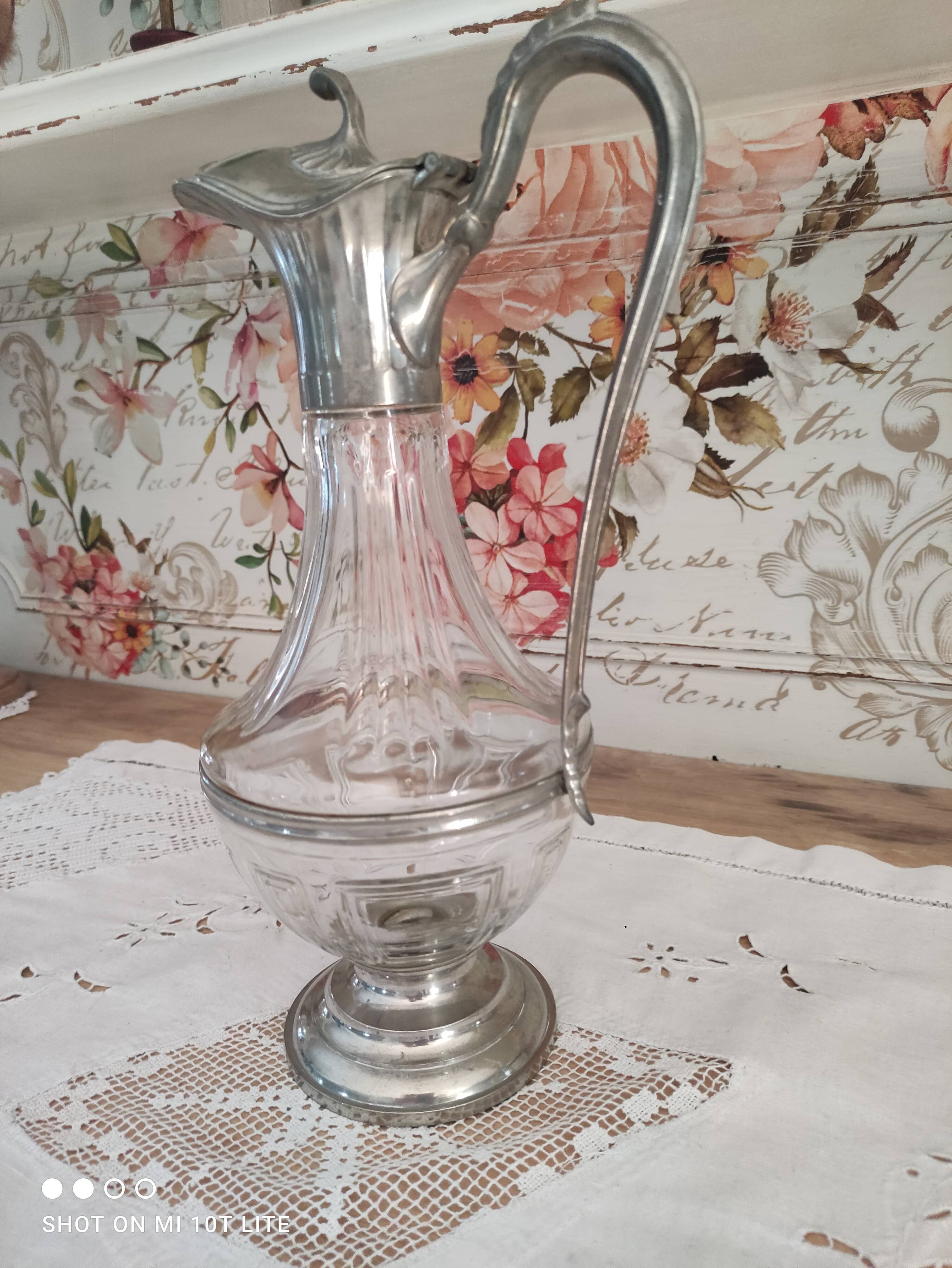 Old water decanter in curved glass and tin Art Nouveau style