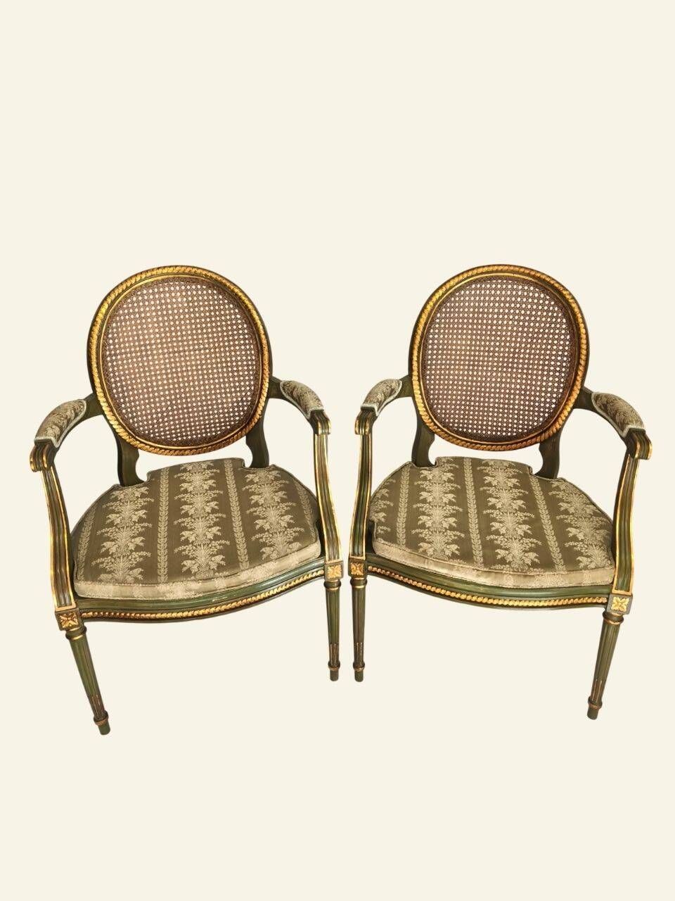 Pair of Louis XVI style armchairs, oval backrest and caning.