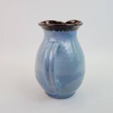 Large blue pitcher with abstract pattern