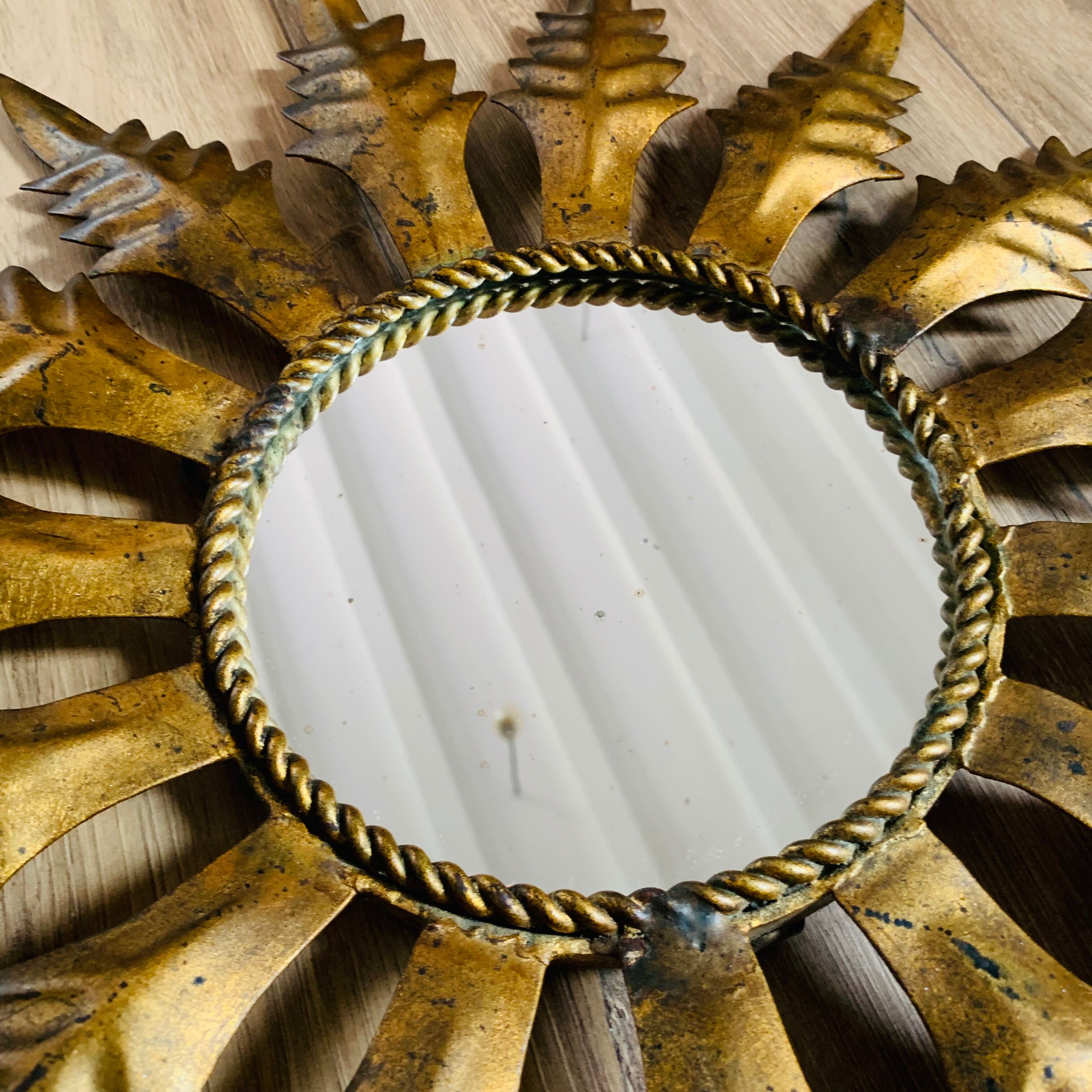 Golden metal sun mirror