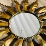 Miroir soleil métal doré