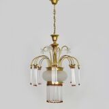 Art Nouveau style chandelier in brass with pendants and glass globe with 3 lights. Italy 70s 80s