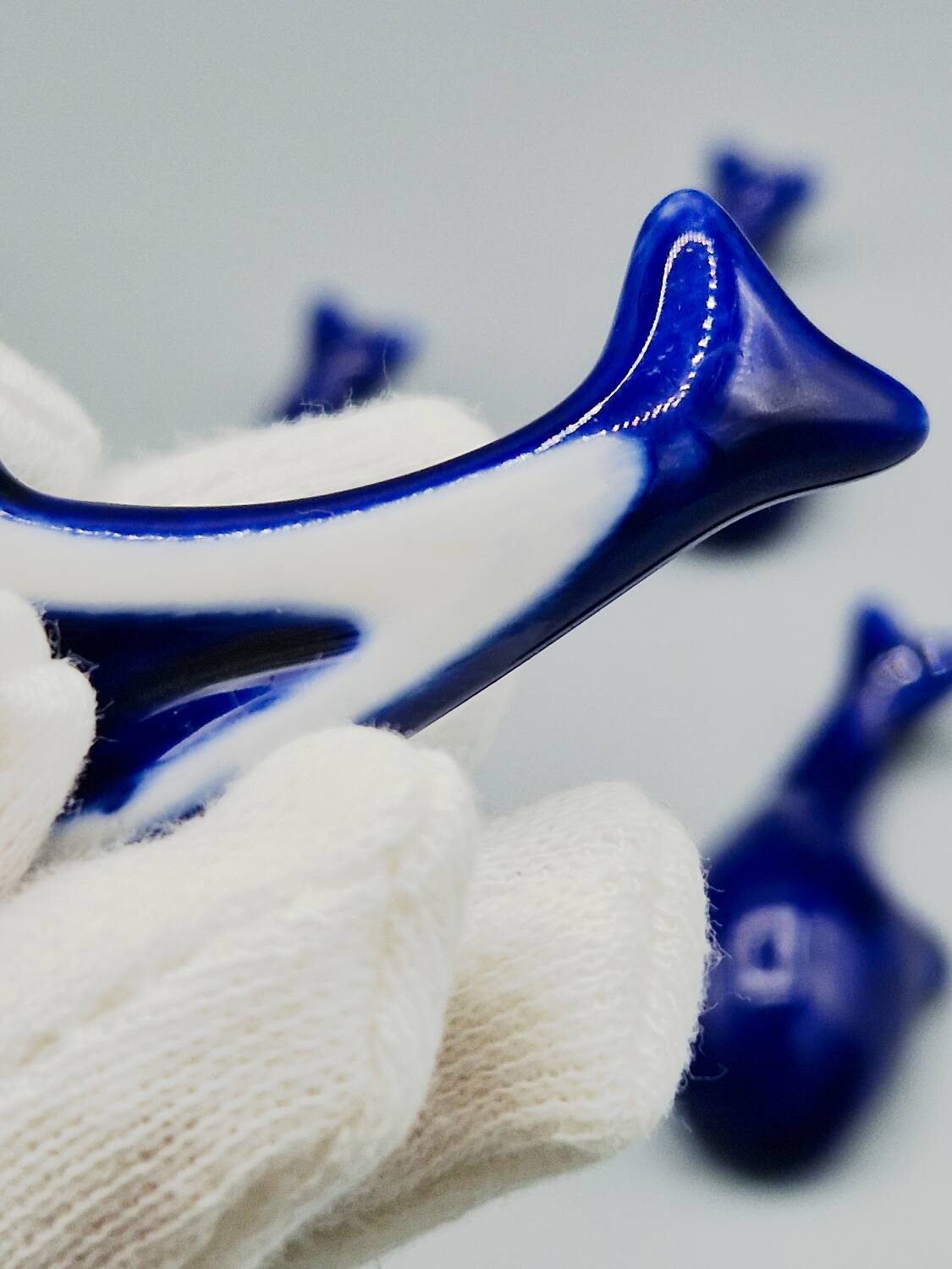 Set of 6 vintage blue porcelain whale knife rests.