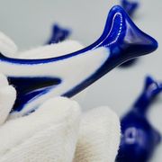 Set of 6 vintage blue porcelain whale knife rests.