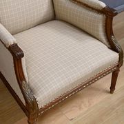 Wingback armchair in walnut, Louis XVI style – late 19th century