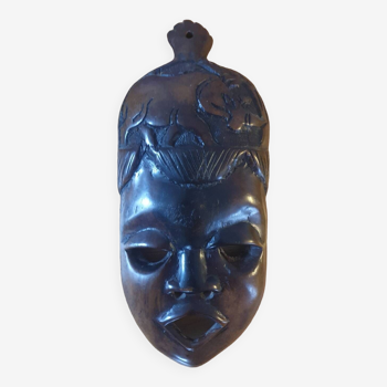 African tribal mask in vintage hand-carved ebony wood