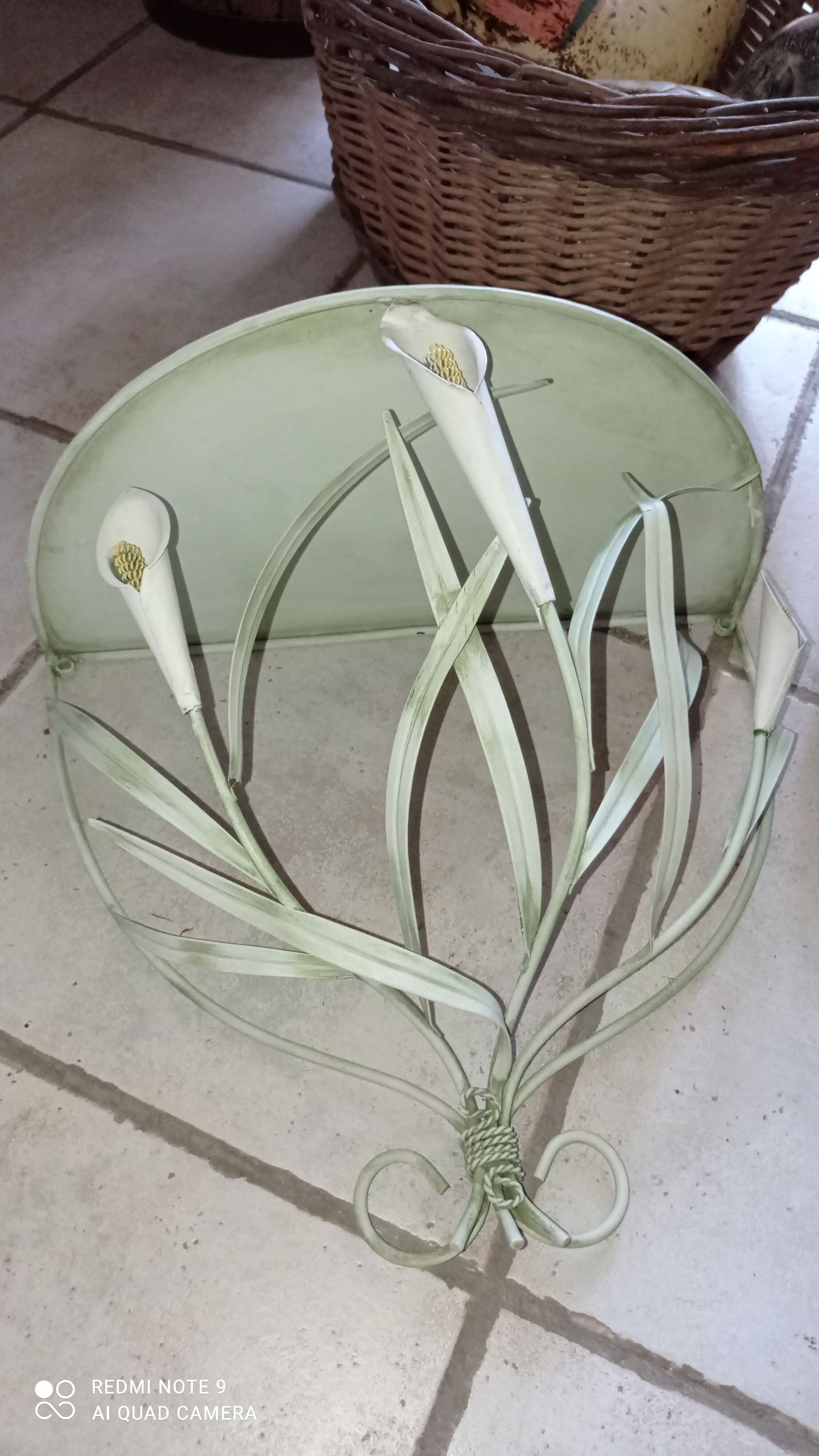 Duo of wrought iron shelves