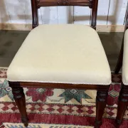 Set of 2 armchairs and 6 English mahogany chairs from the 1950s.