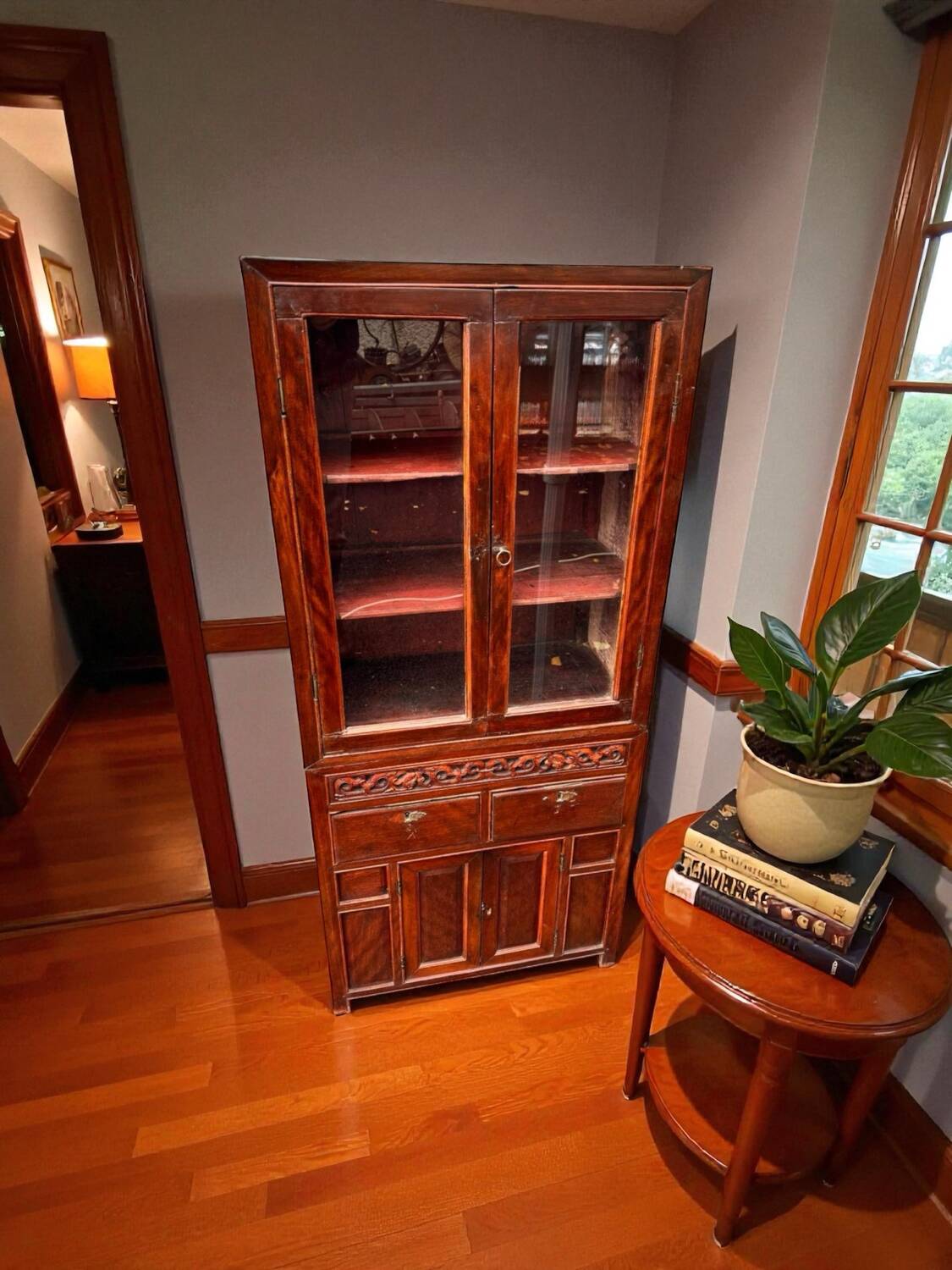 Attractive two-part Indochinese display cabinet. Mid-20th century