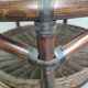 Vintage rattan coffee table with smoked glass top and rattan basket shelf
