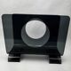 Vintage 1970s smoked plexiglass magazine rack, minimalist design.