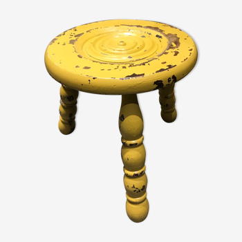 Old tripod stool turned wood