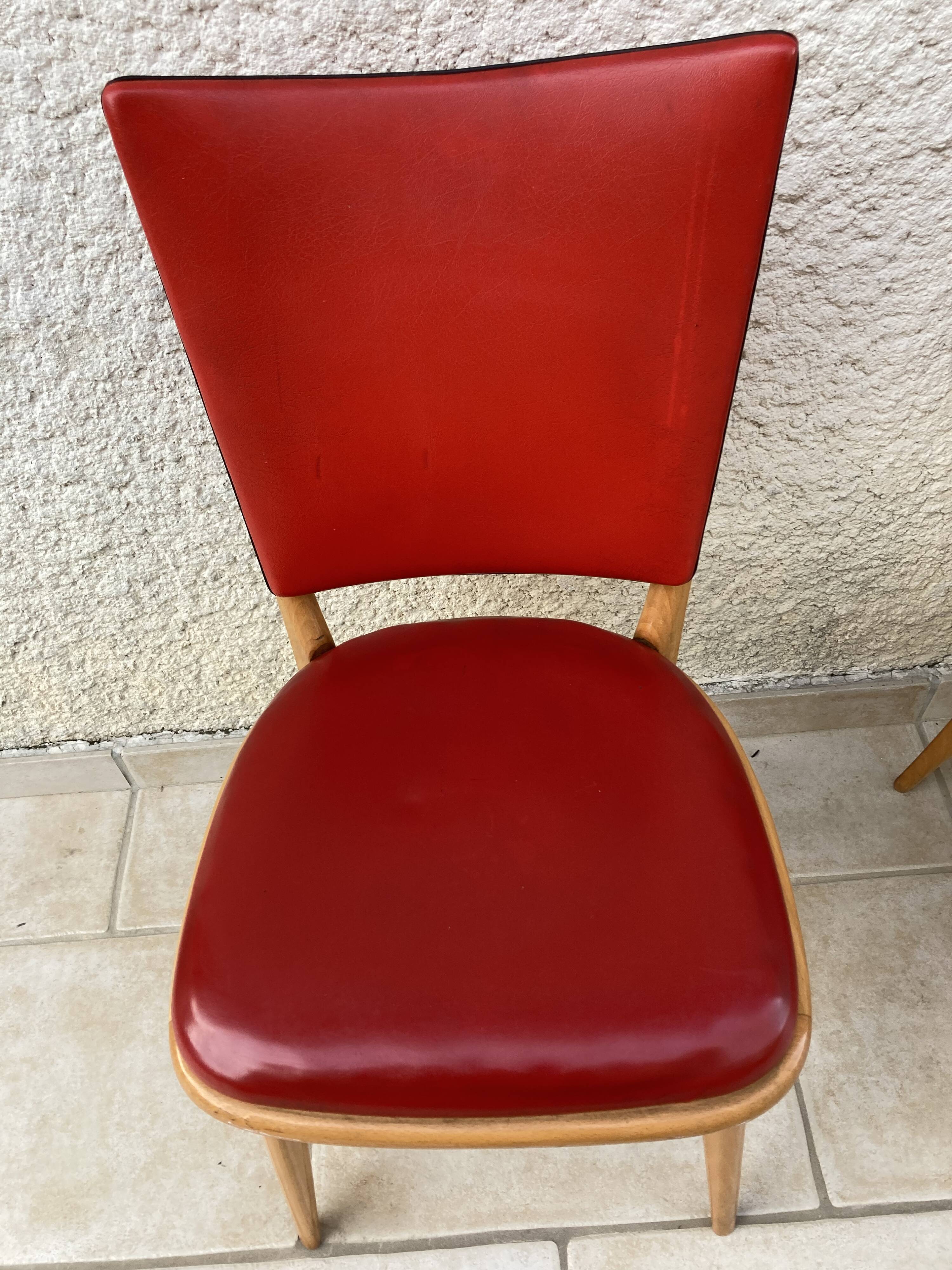 3 chairs in red Skaï