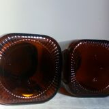 Duo of vintage apothecary bottles in amber glass