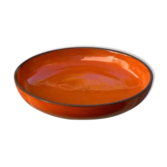 The orange ceramic dish