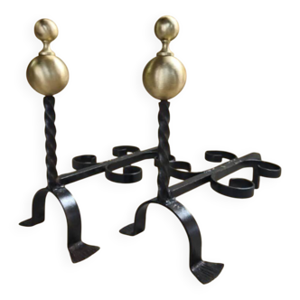 Pair of wrought iron candlesticks with cast bronze ball, 1970s.