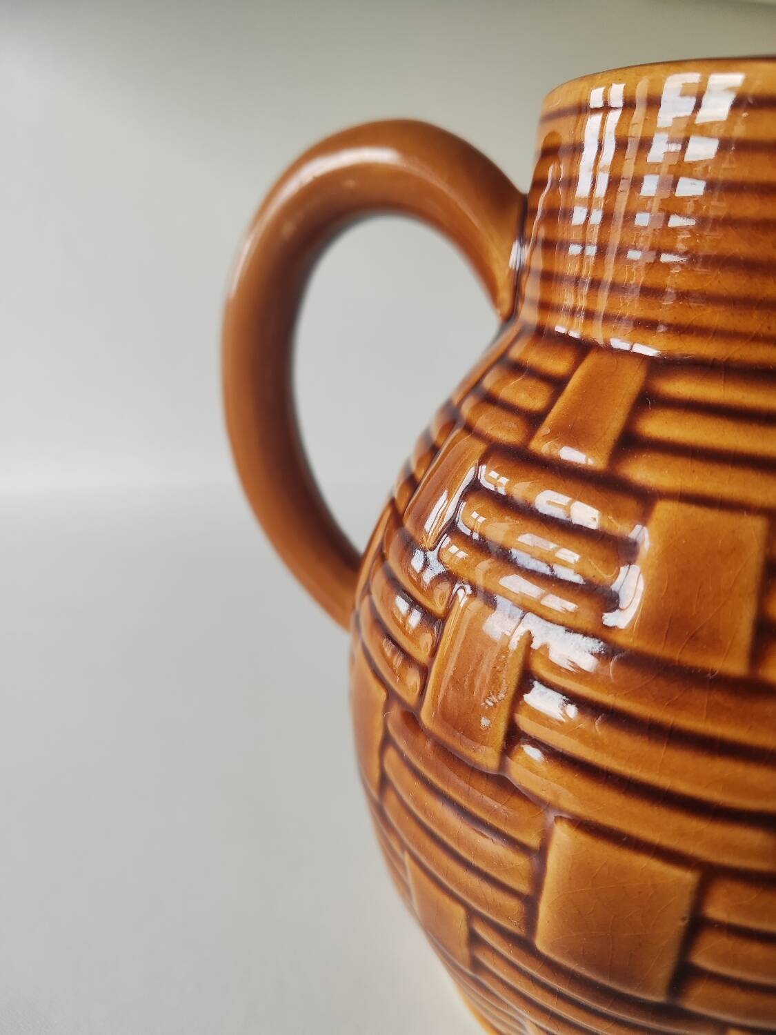 Caramel brown pitcher in glazed ceramic with barbotine finish from the 60s