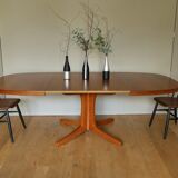 Baumann oval walnut table with extension cords
