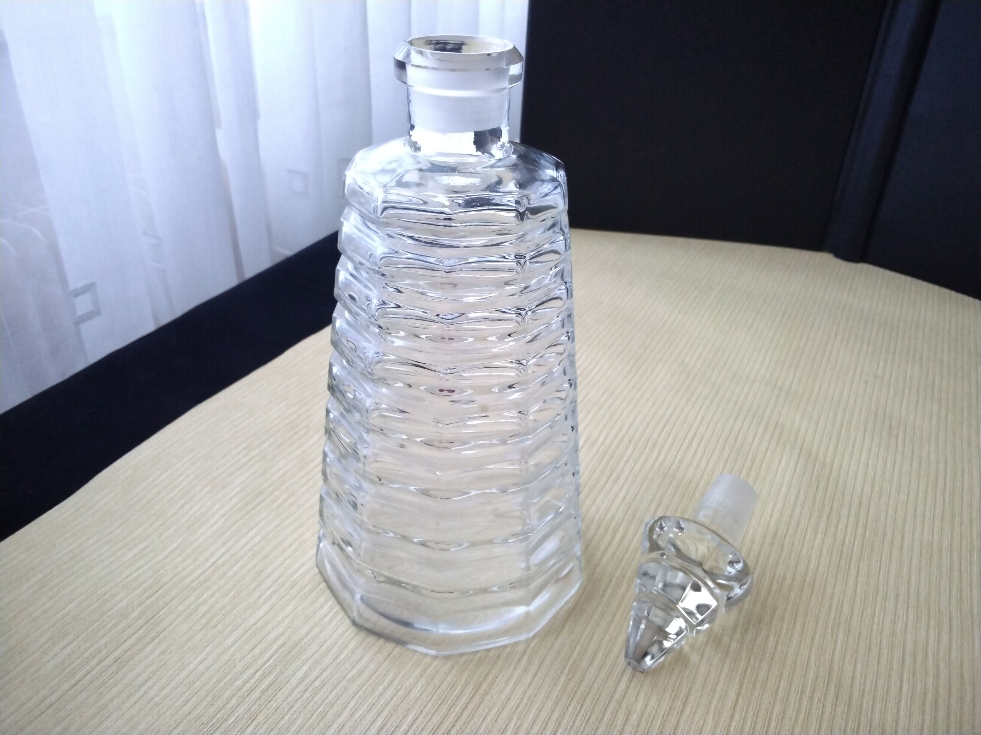 Glass perfume or eau de toilette bottle