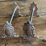 Series of 12 monogrammed silver metal knife holders