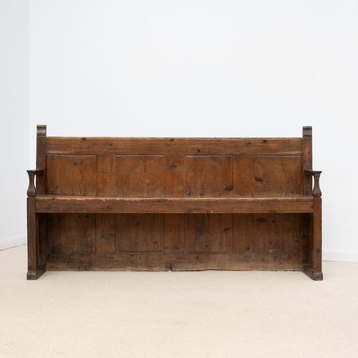 Old wooden bench with panelled backrest – 19th century