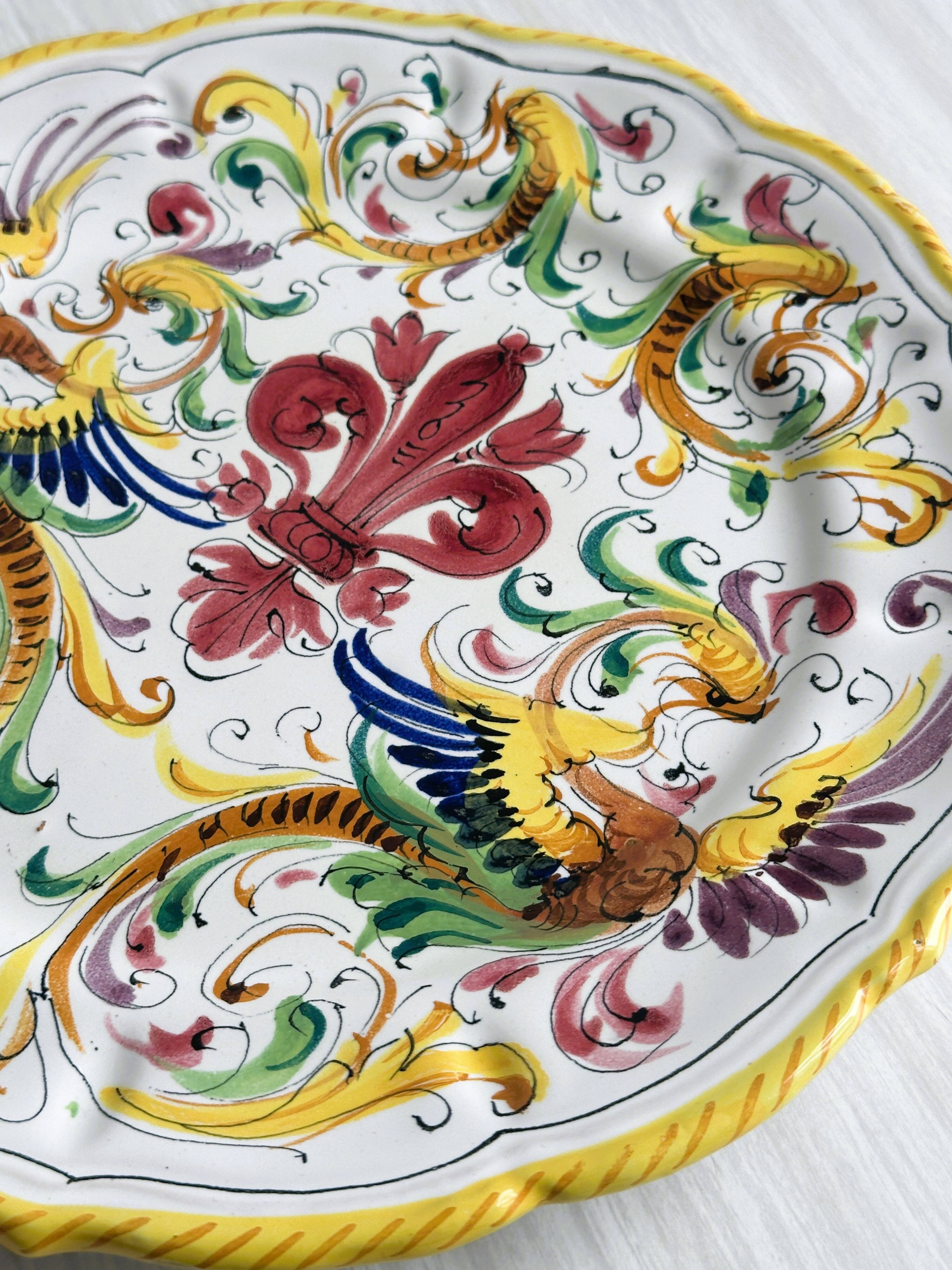 Decorative wall plate in hand-painted earthenware