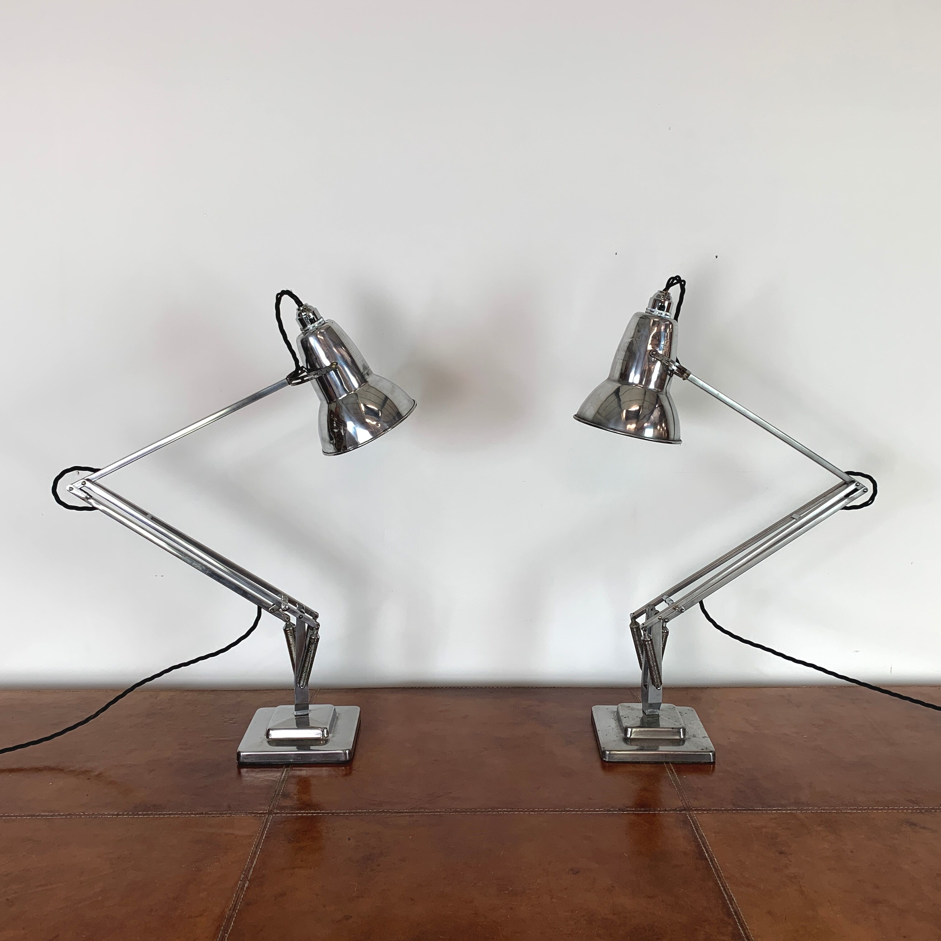 Pair of vintage stripped and polished Herbert Terry anglepoise lamps