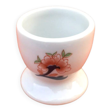Ulysse Paris porcelain egg cup for Chanill with floral decoration.