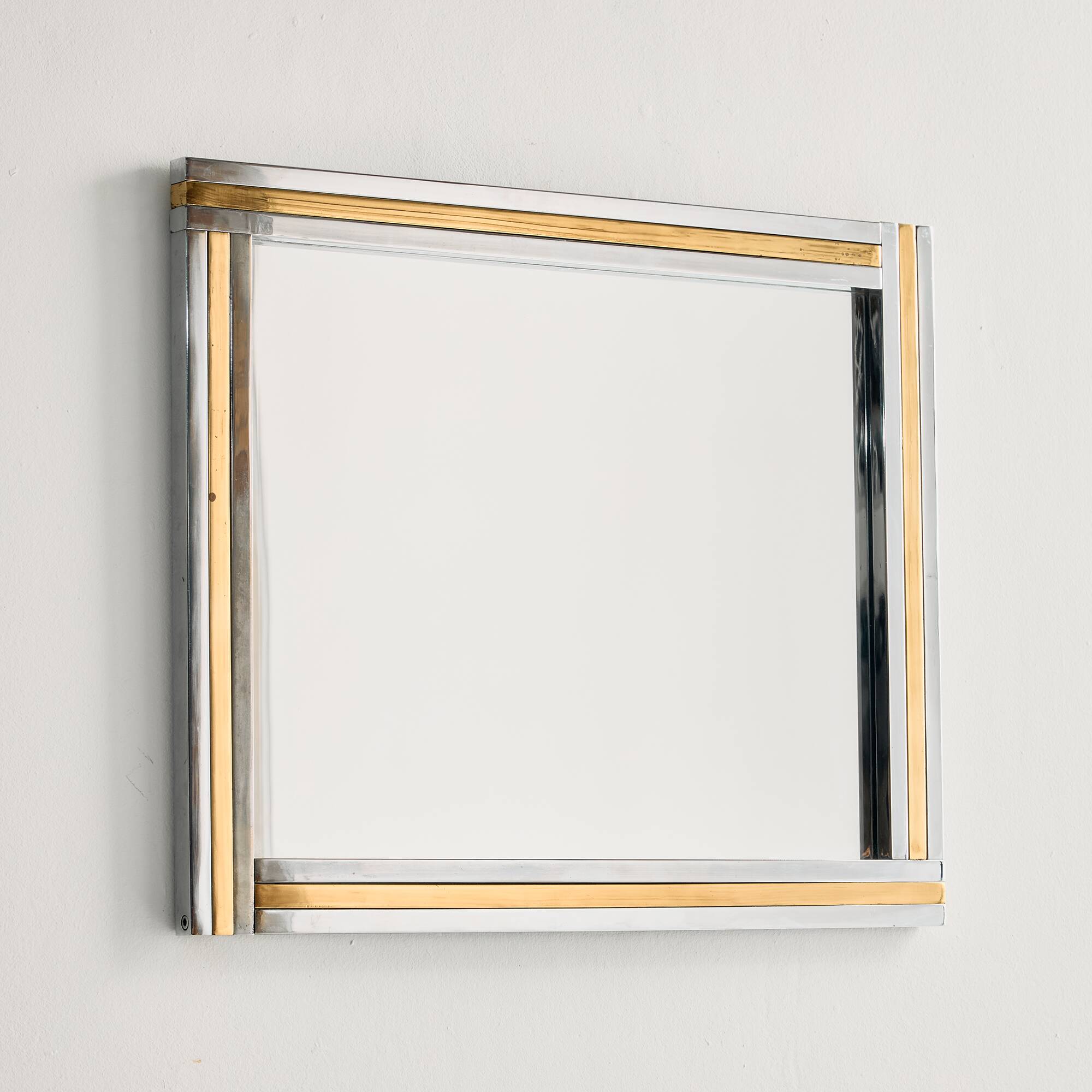 Miroir encadré en laiton et chrome