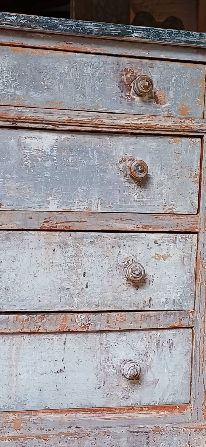 Antique piece of furniture with a grey patina.