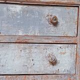 Antique piece of furniture with a grey patina.