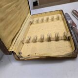 12 silver-plated knives from the mid-20th century