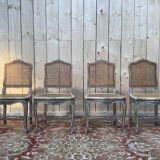 Suite de 4 chaises cannées de style Louis XV rechampi