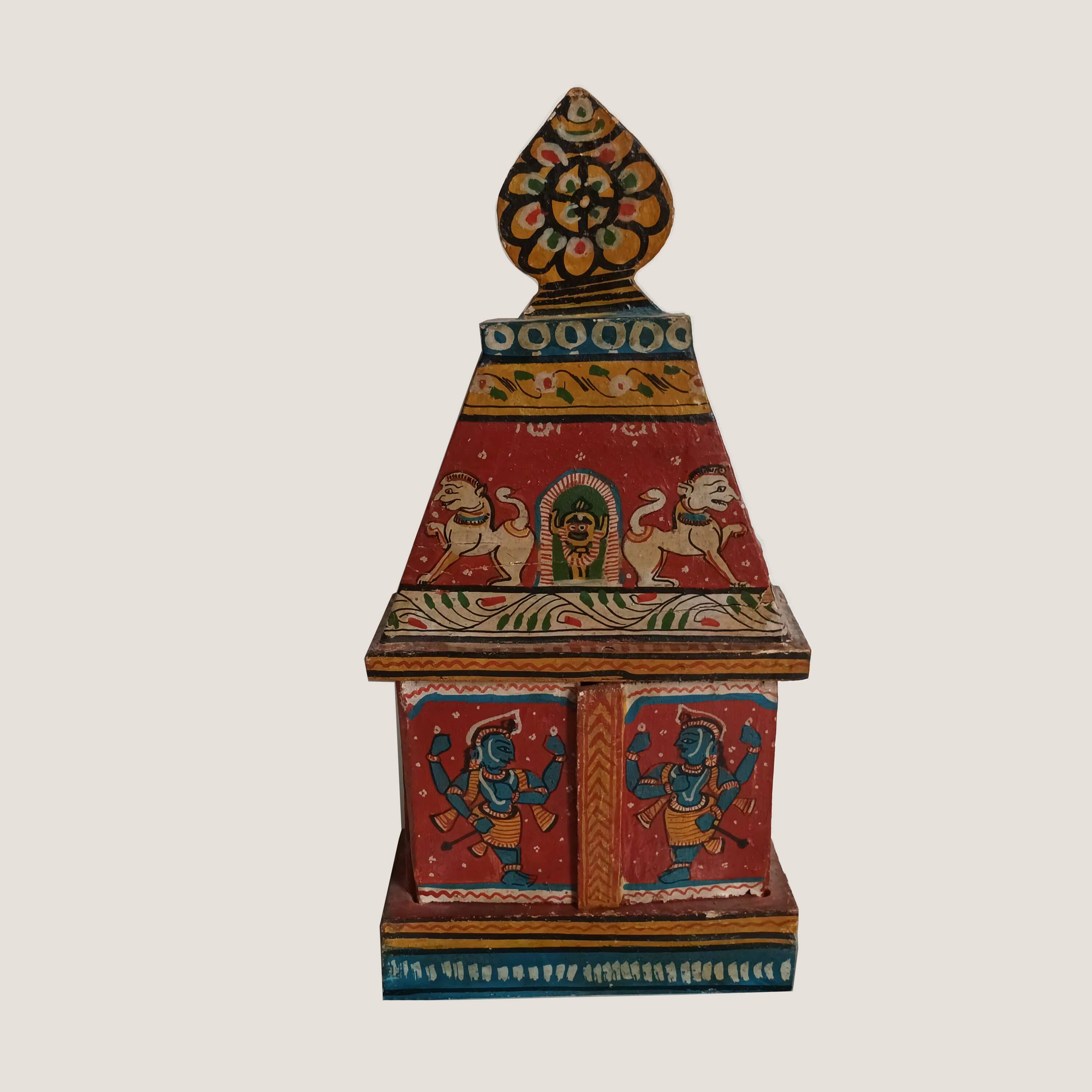 Indian temple made of hand-painted wood