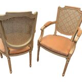 Pair of Louis XVI style armchairs in 20th century patinated beech