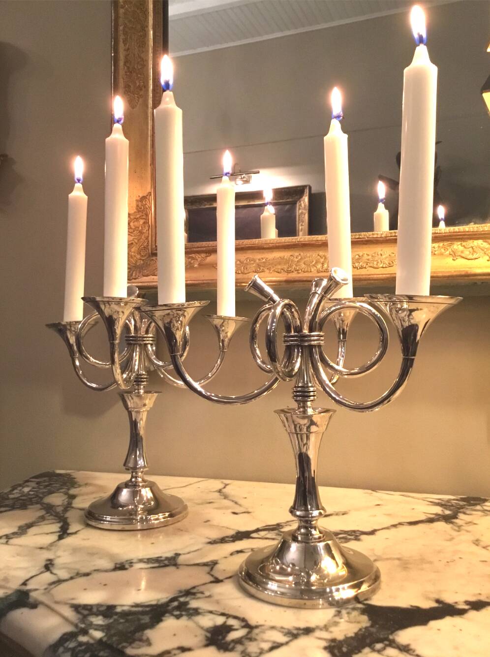 Ercuis House. Pair of three-light candelabra in silver-plated metal