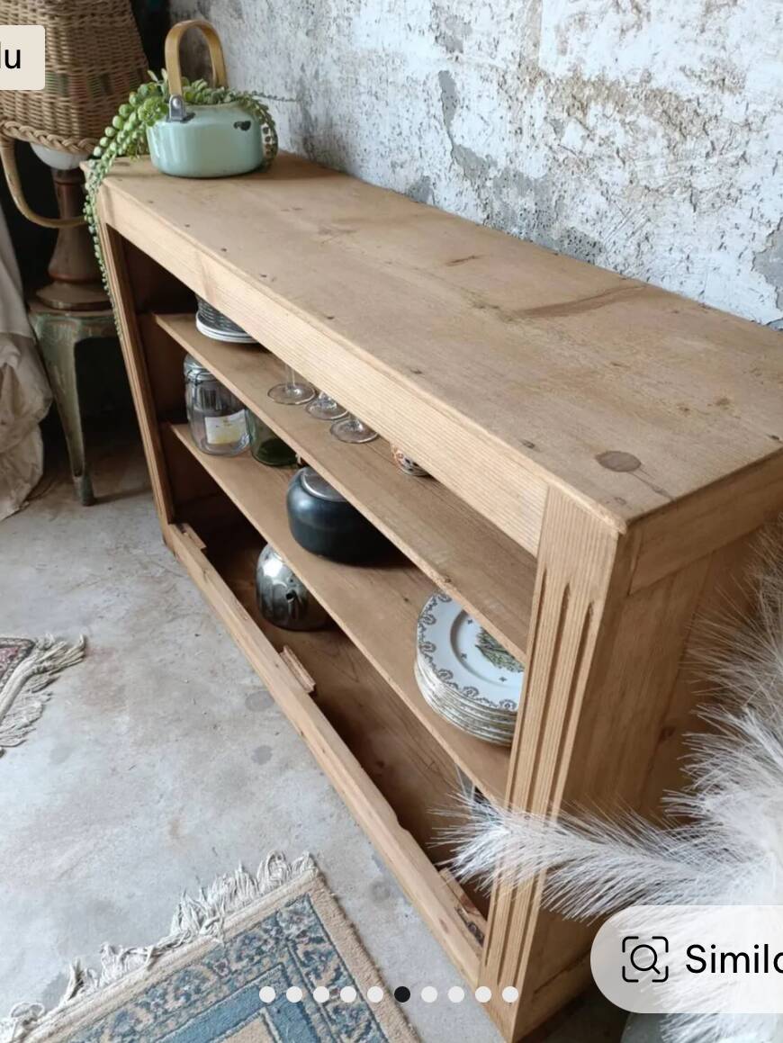 Open wooden chest of drawers